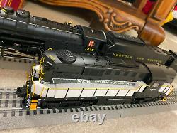LIONEL O Scale Fastrack Train collection. 2 beautiful engines, cars, buidings, etc