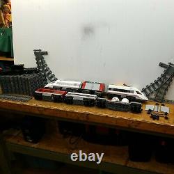 Lego city high speed bullet train, track, switches, extra cars, motor. No remote