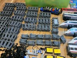 Lego trainsets joblot including station, multiple trains, approx 180 track parts