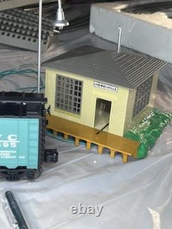 Lionel train set complete with tracks, remote and more