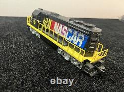 NASCAR Train Set. 5 Cars, 1 NASCAR Sign, 12 Tracks. Manual, Power Box