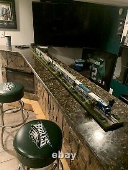 Two Philadelphia Eagles Train sets with train displays