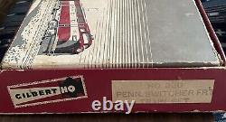 Vintage Gilbert HO train set with steam engine, 3 cars, and track. DC. #HO-320