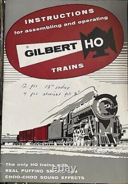 Vintage Gilbert HO train set with steam engine, 3 cars, and track. DC. #HO-320
