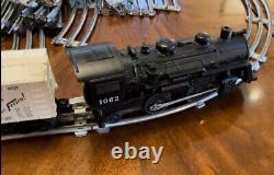 Vintage Lionel O Gauge Train Set. Track. Locomotive. Coal Car. Caboose. Trestle