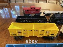 Vintage Lionel O Gauge Train Set. Track. Locomotive. Coal Car. Caboose. Trestle