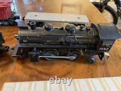 Vintage Lionel O Gauge Train Set. Track. Locomotive. Coal Car. Caboose. Trestle