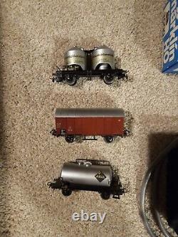 Vintage Marklin Train Set With 2 Controllers, 1 Engine, and 3 Cars