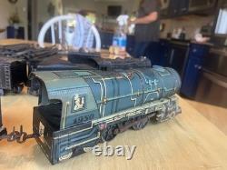 Deux ensembles de trains miniatures vintage