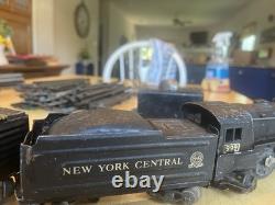 Deux ensembles de trains miniatures vintage