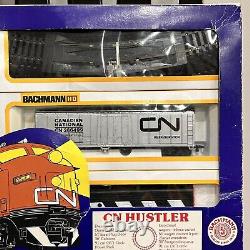 Ensemble de train BACHMANN HO « CN Hustler » complet, vintage, avec transformateur, voies et wagons.