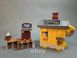 Ensemble de train Fisher Price GeoTrax avec bâtiments et rails