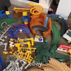 Ensemble de train Fisher Price GeoTrax avec bâtiments, rails et voitures - Lot de 170+ pièces Disney