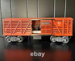 Ensemble de train Lionel Vintage comprenant une piste ovale, un enclos pour animaux + une tour non testés