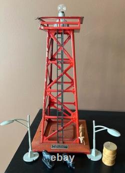 Ensemble de train Lionel Vintage comprenant une piste ovale, un enclos pour animaux + une tour non testés