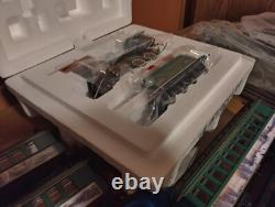 Ensemble de train de Noël : locomotive, 9 voitures, 4 rails droits, 2 aiguillages, 22 courbes