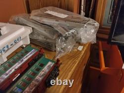 Ensemble de train de Noël : locomotive, 9 voitures, 4 rails droits, 2 aiguillages, 22 courbes