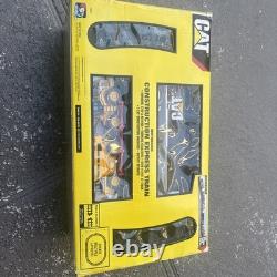 Ensemble de train motorisé Caterpillar CAT Construction Express avec rails supplémentaires