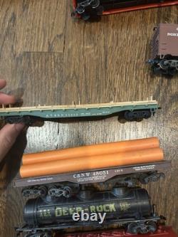 Ensemble de trains miniatures anciens comprenant 10 trains et un ensemble de rails avec plus de 150 pièces