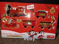 Mickey Mouse Holiday Express 21 Piece Train Set 15ft Track 3d Mickey Character	 <br/>    <br/>L'Express de Vacances de Mickey Mouse - Ensemble de Train de 21 Pièces avec Piste de 15ft et Personnage en 3D de Mickey